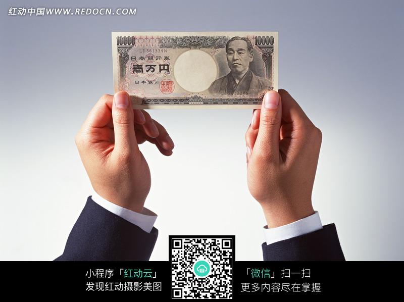 拿着一万日元的手图片(编号:1139101)_金融货币_商务金融_图片素材
